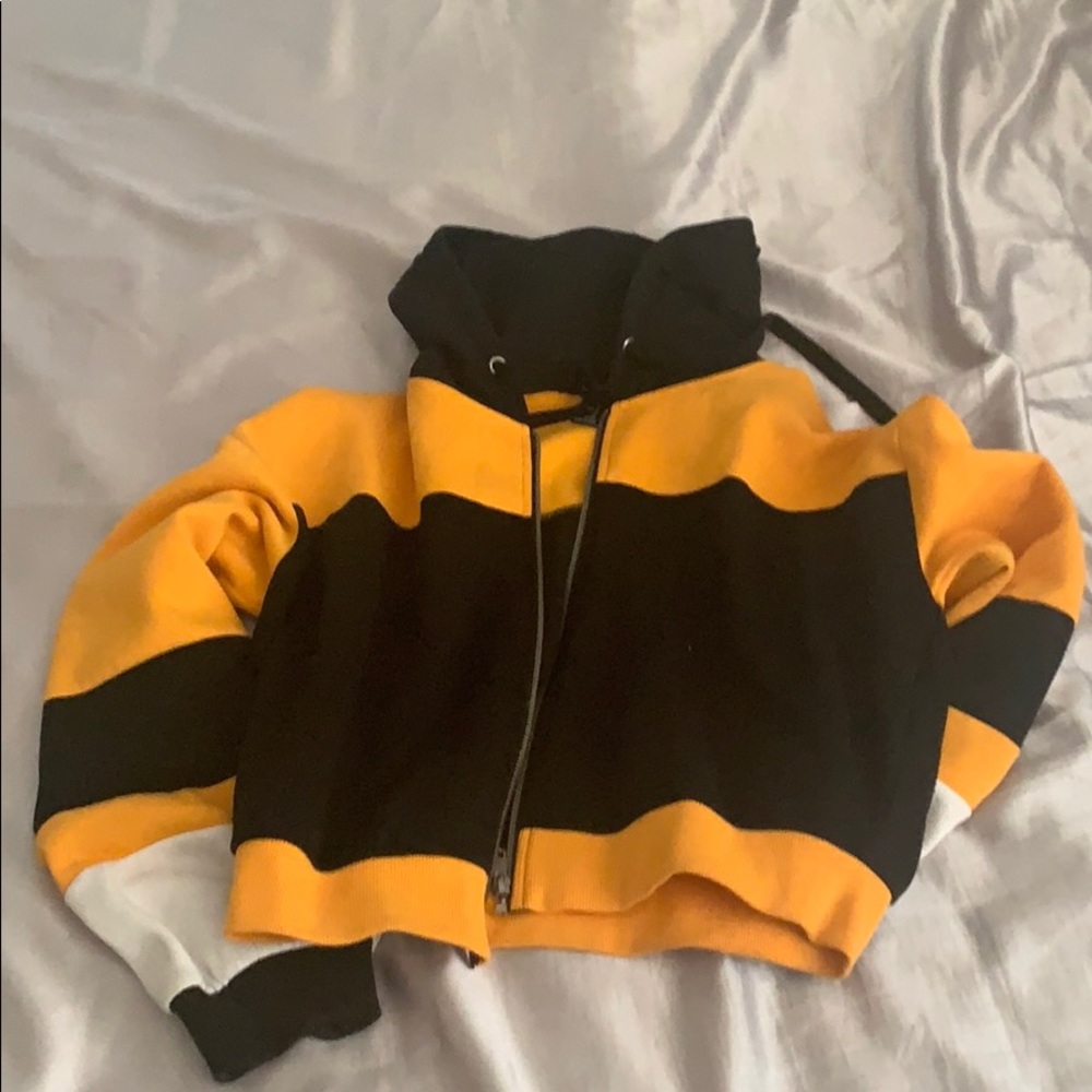 Casual black, orange, and white jacket